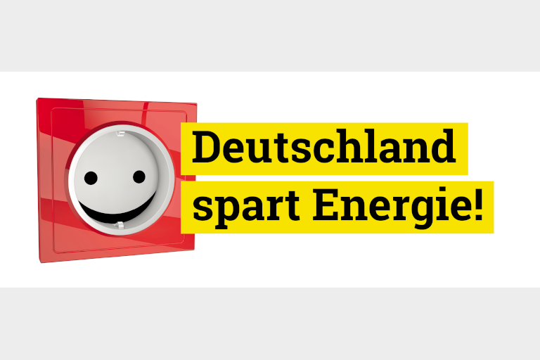 Lachende Steckdose, Keyvisual; Deutschland spart Energie